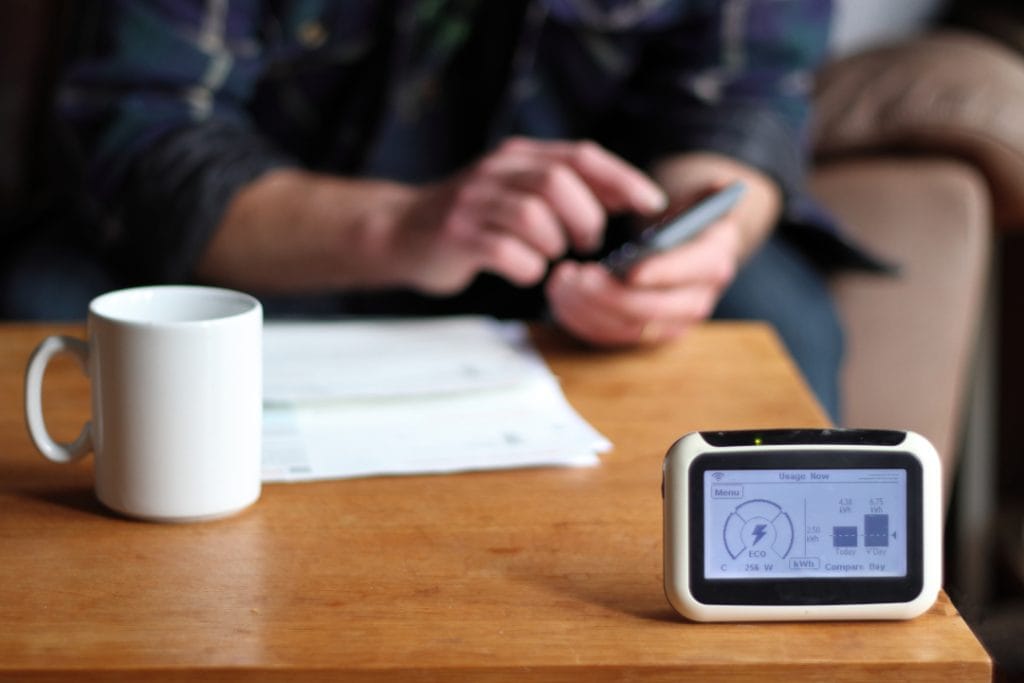 Hands of person paying fuel bills